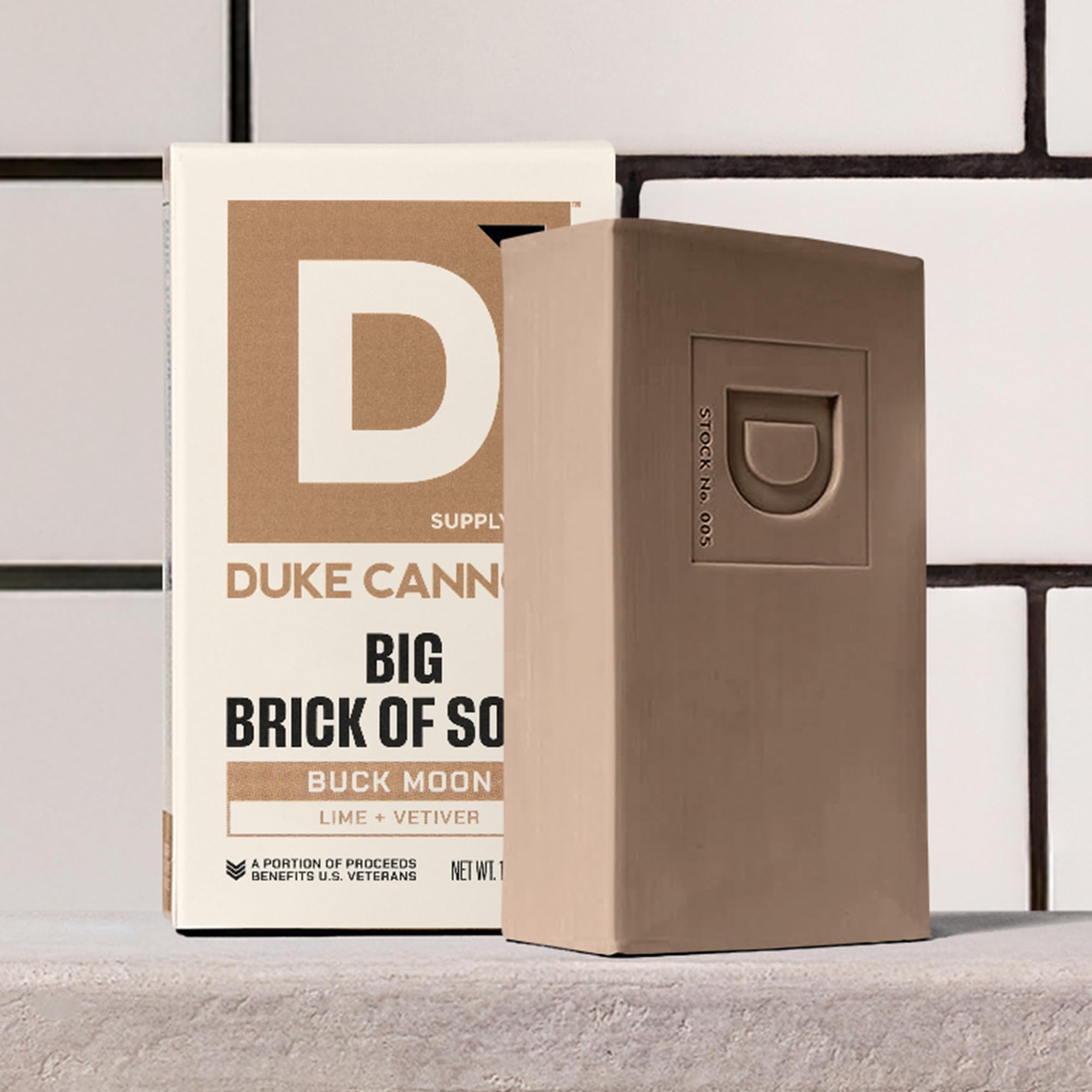 Duke Cannon Supply Co. soap styled outdoors evoking rugged lime and vetiver scent benefit