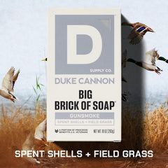 Duke Cannon Gun Smoke side profile revealing dense triple-milled soap texture for rich lather