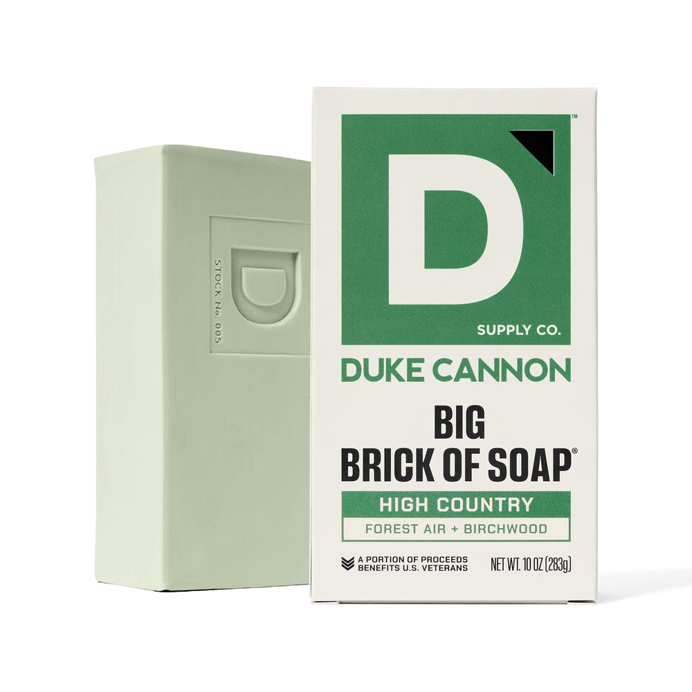 Duke Cannon bar in outdoor shower scene evoking fresh mountain scent benefit
