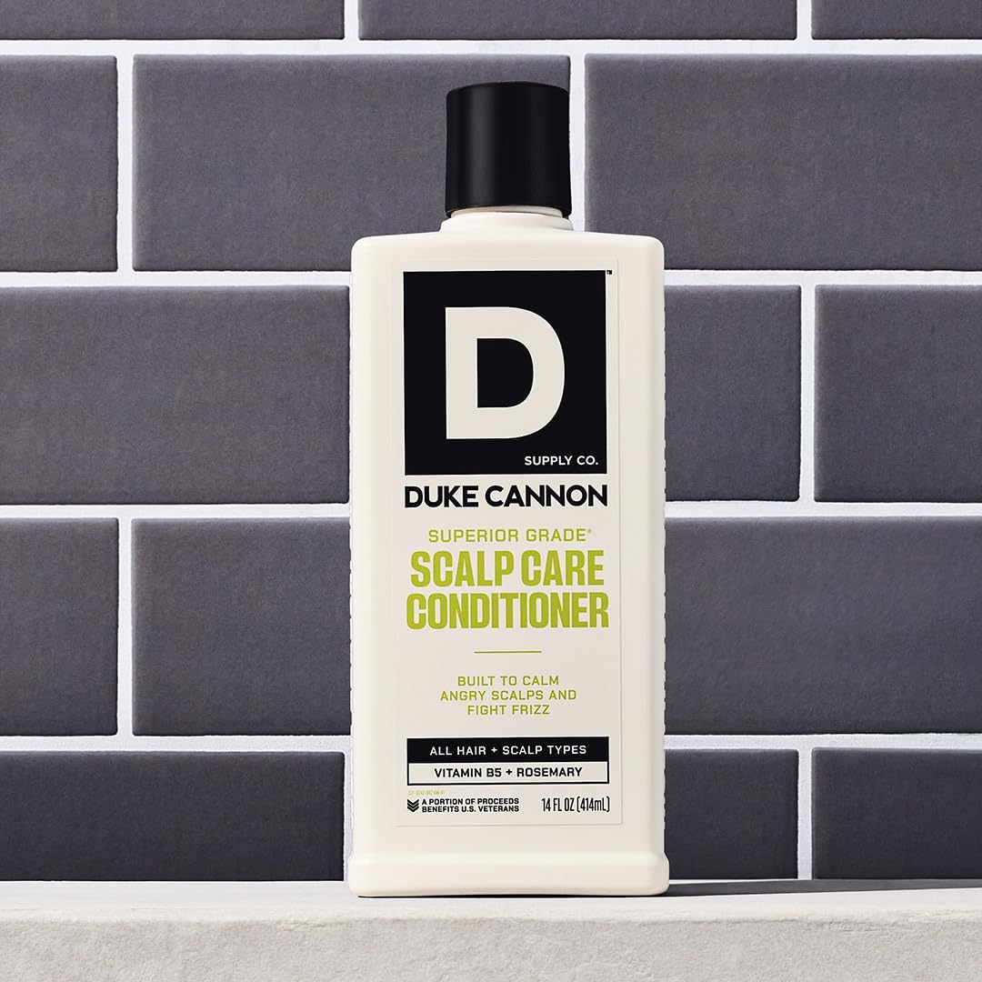Duke Cannon label close-up with rosemary and arnica callouts, botanical soothing benefit