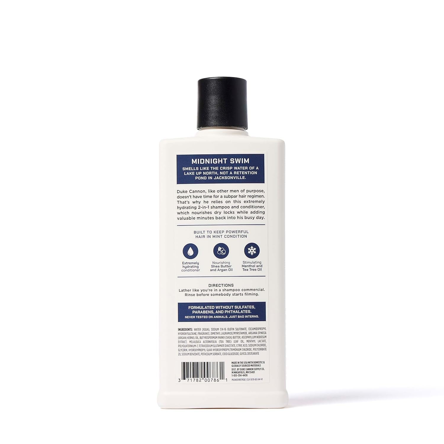 Duke Cannon bottle next to ruler showing 14 fl oz size and travel convenience