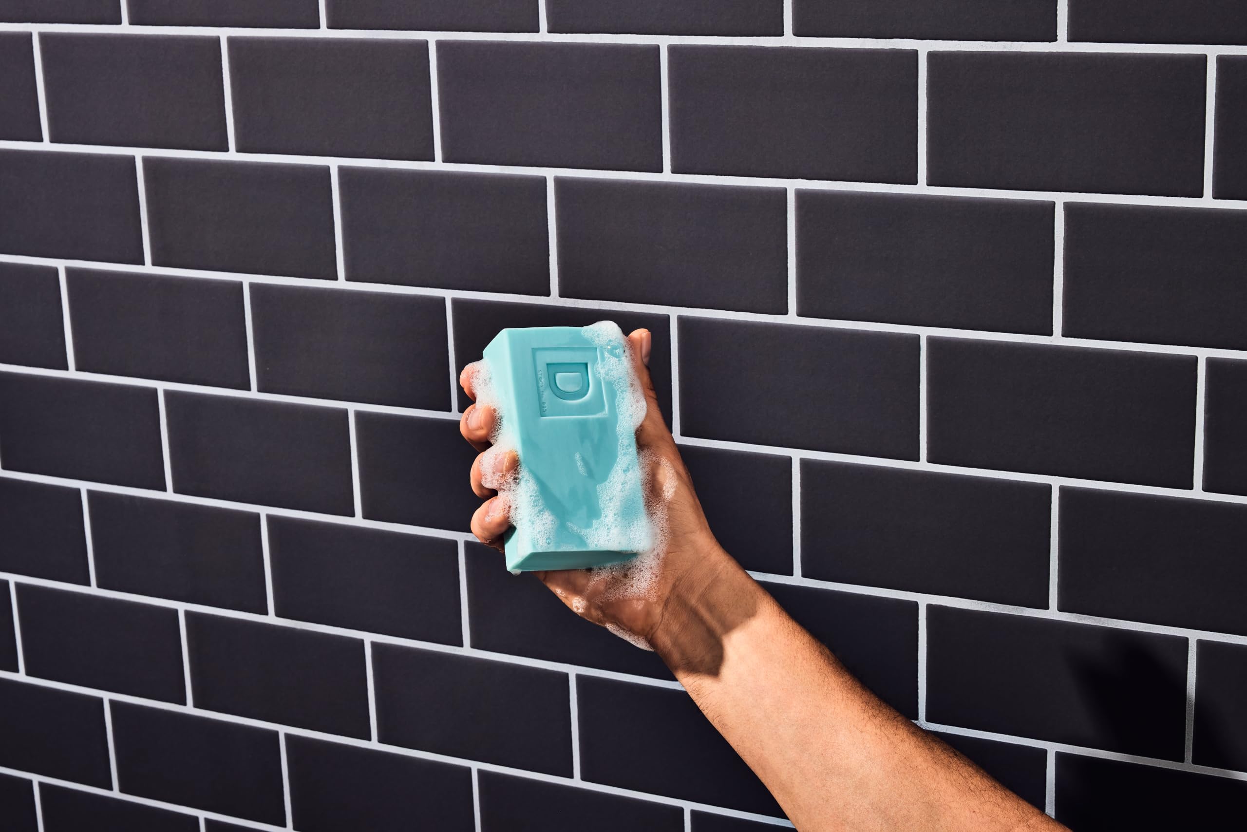 Duke Cannon Midway rich lather closeup on skin, demonstrates effective cleansing foam