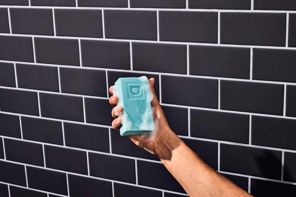 Duke Cannon Midway rich lather closeup on skin, demonstrates effective cleansing foam