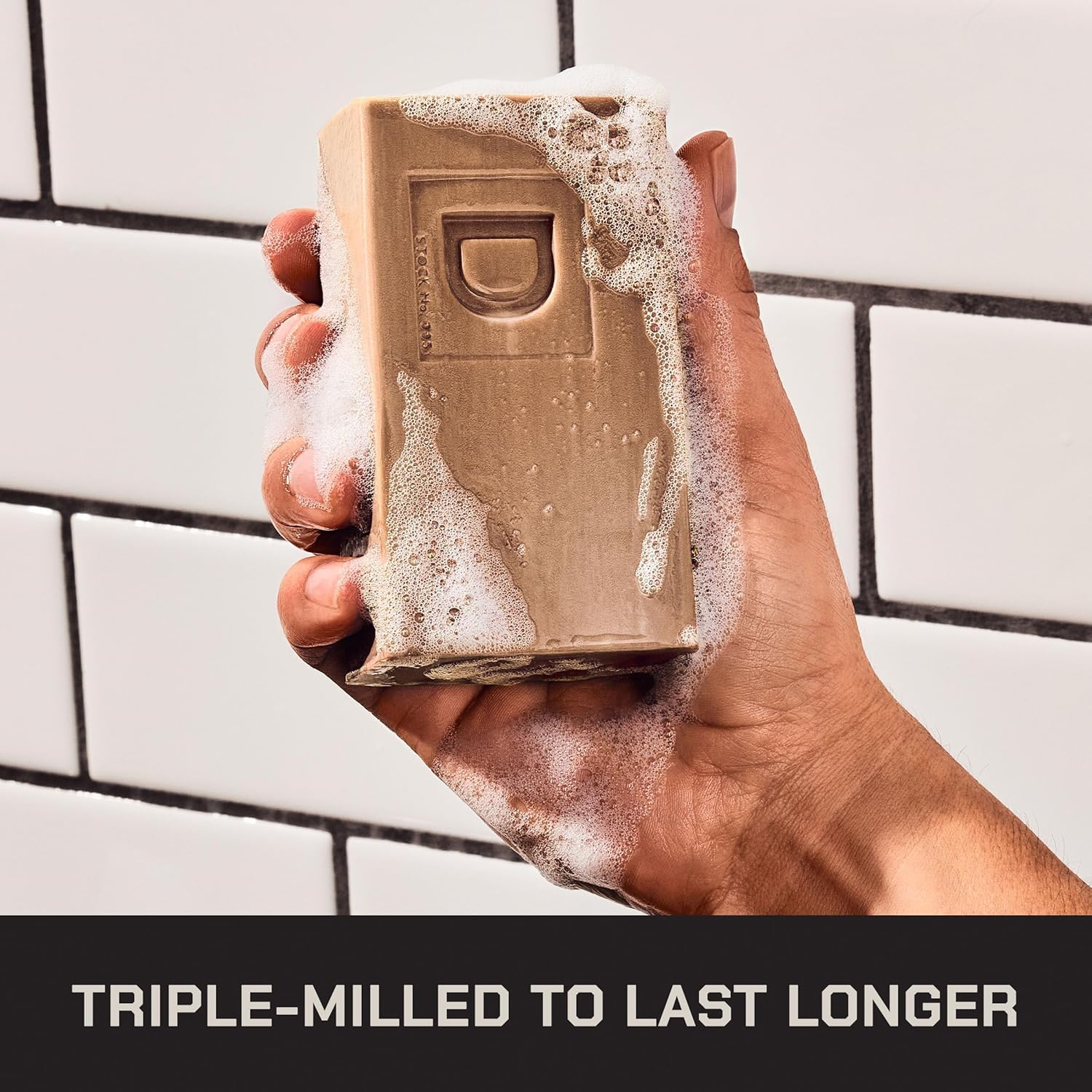 Duke Cannon bar in shower creating dense lather for thorough cleansing