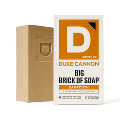 Duke Cannon bar staged outdoors evoking cedar-alpine scent and adventurous appeal