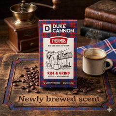 Duke Cannon bar staged with coffee beans conveying Rise & Grind scent boost benefit