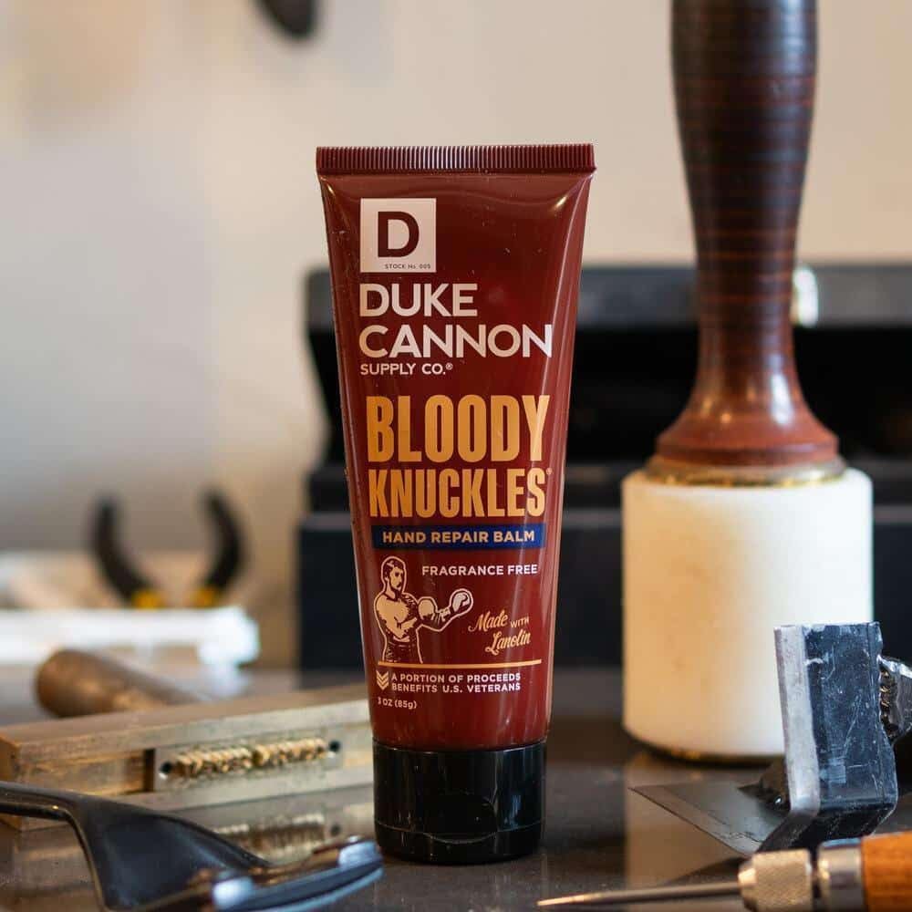 Duke Cannon close-up of tube label highlighting ingredients and size benefits