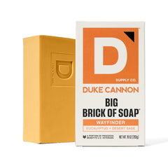 Duke Cannon lifestyle shot outdoors evoking Wayfinder eucalyptus and desert sage inspiration