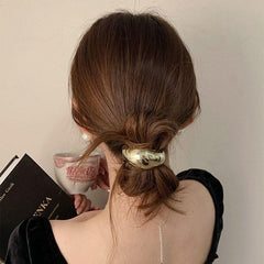 Duleylv close-up of geometric metal cuff highlighting smooth edges for gentle wear