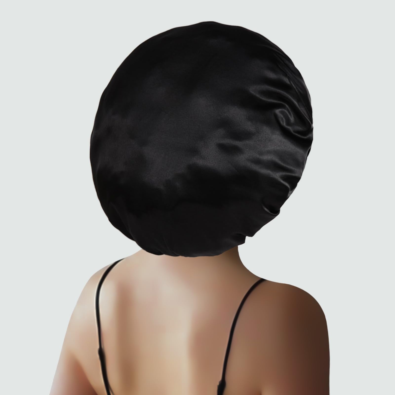 DUOMODRAGON bonnet next to hand showing oversized 17-inch capacity