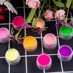 Duufin pigment applied on nail swatch creating vibrant, high-gloss finish
