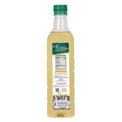 DWARAKA castor oil drop close-up showing thick texture and nutrient-rich sheen