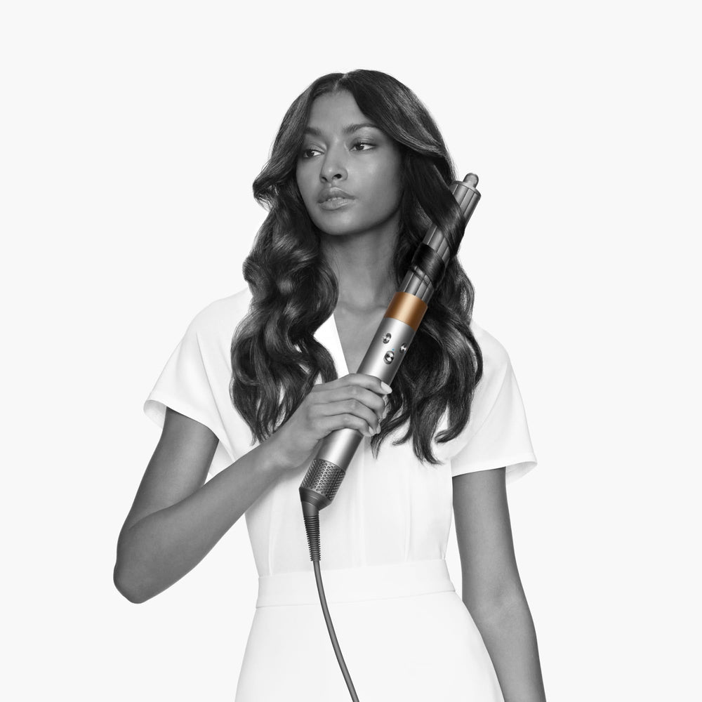 Dyson Airwrap rotating cool tip close-up highlighting ease of switching curl direction and safety