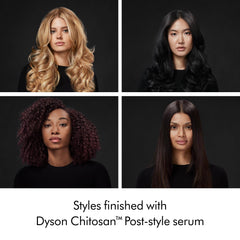 Applying Dyson serum through mid-lengths, smoothing frizz and defining style