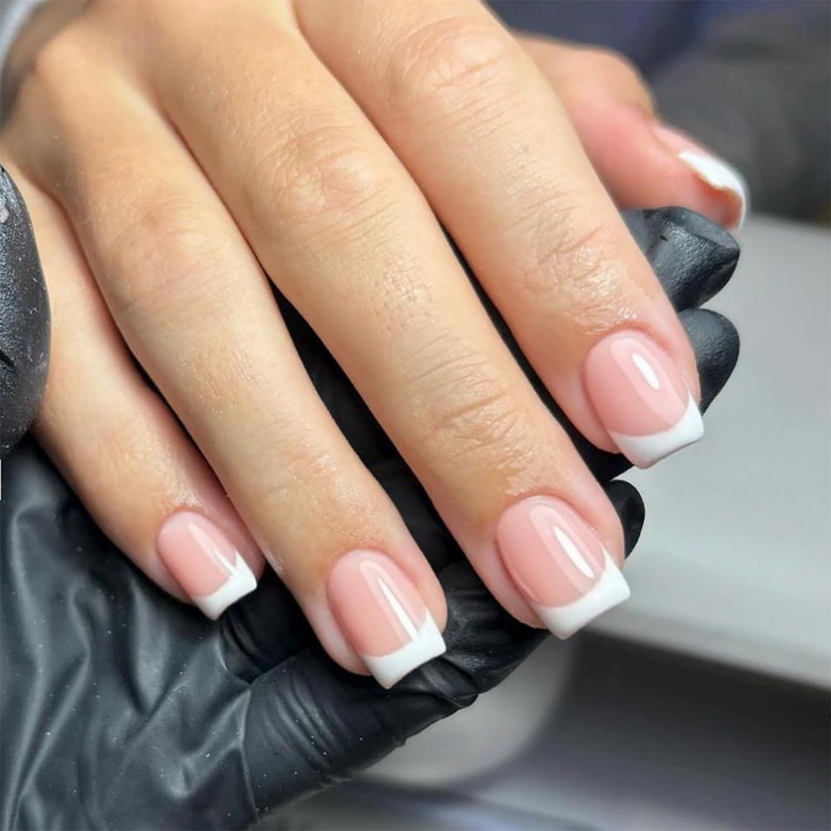 DZPGUONIZ front view of full 24-piece white French tip set showing ready-to-wear benefit