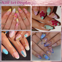 EARLMONI finished summer manicure on nails with charms demonstrating beach vibe