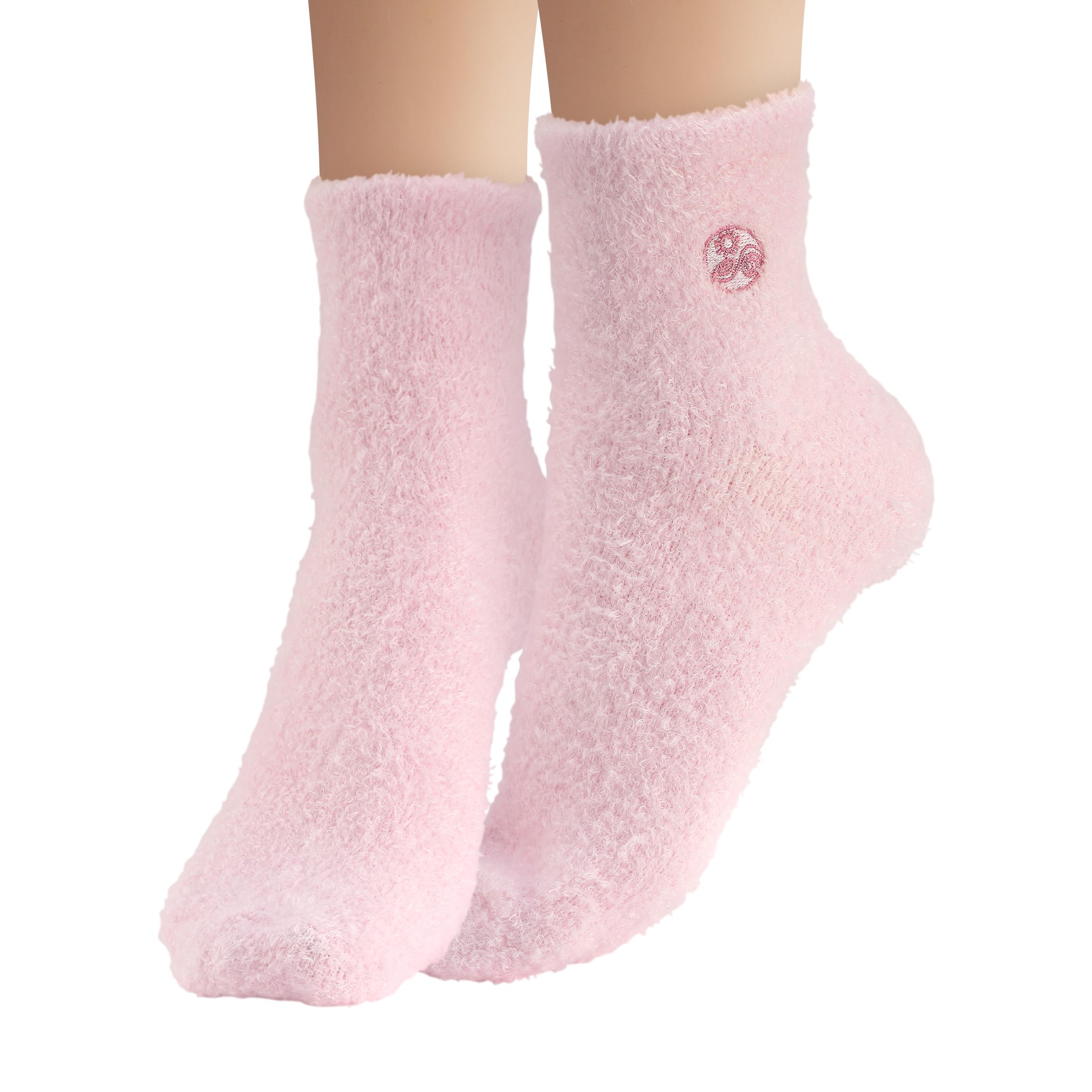 Earth Therapeutics aloe vera socks worn on feet in bed demonstrating overnight hydration