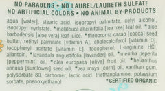 Earth Therapeutics balm being held in hand illustrating easy application