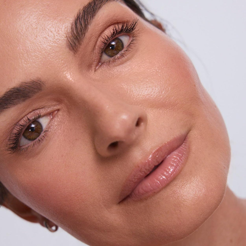 EarthsCure highlighter stick sheen detail showing luminous soft glow