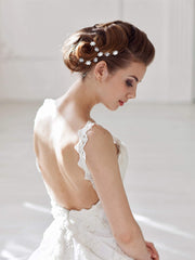 EBOOT hair pins in updo showing secure hold and decorative sparkle for events