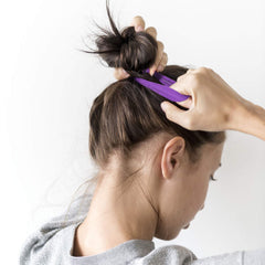 EBOOT bands inside travel bag for convenient on-the-go styling
