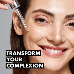 Eclat Skincare serums held in hand to show size and travel-friendly convenience