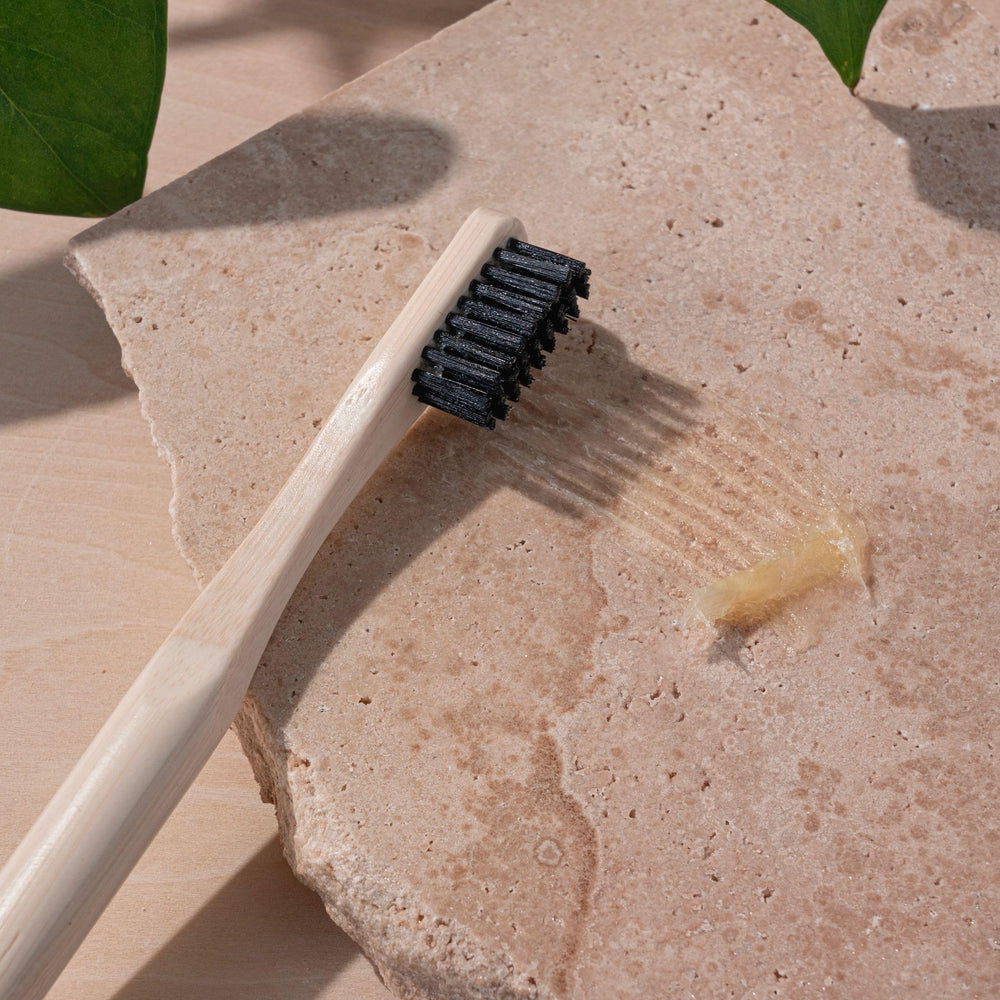EcoTools brush paired with styling gel showing product compatibility