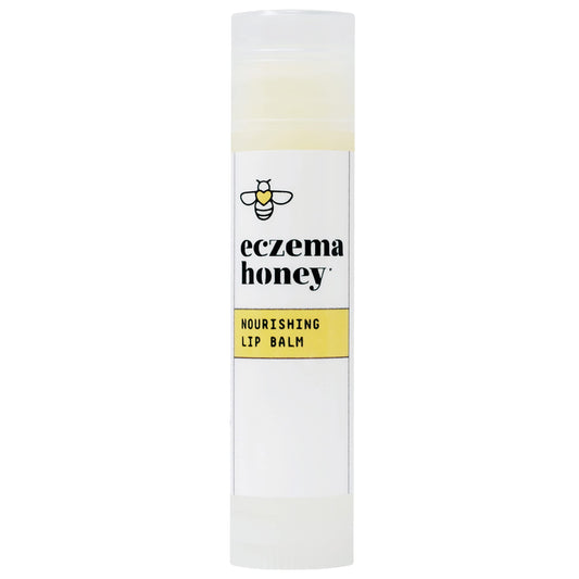 ECZEMA HONEY front view of twist-up lip balm shows clear branding and easy use
