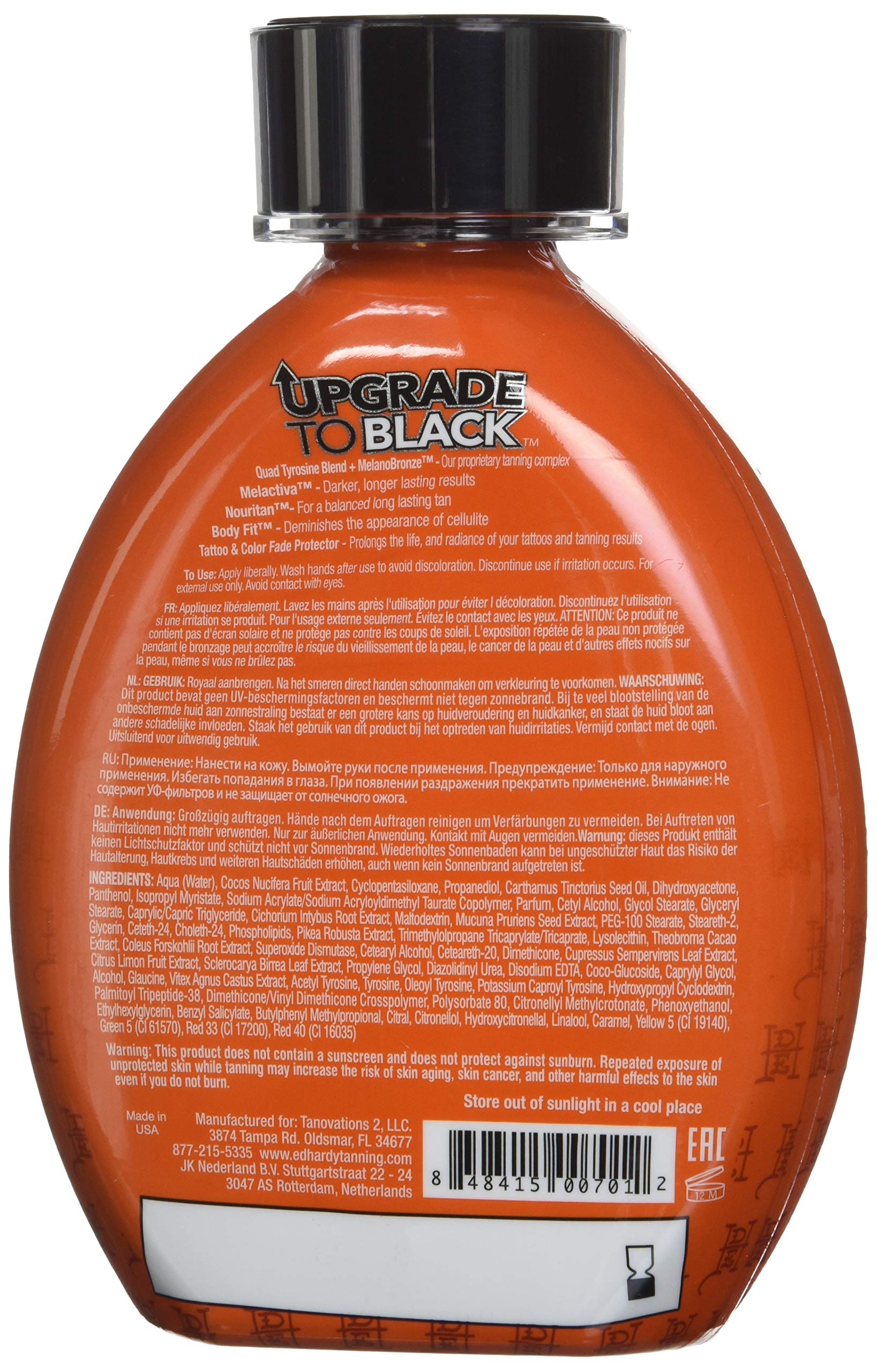 Ed Hardy lotion being applied to skin for smooth, deep tanning results
