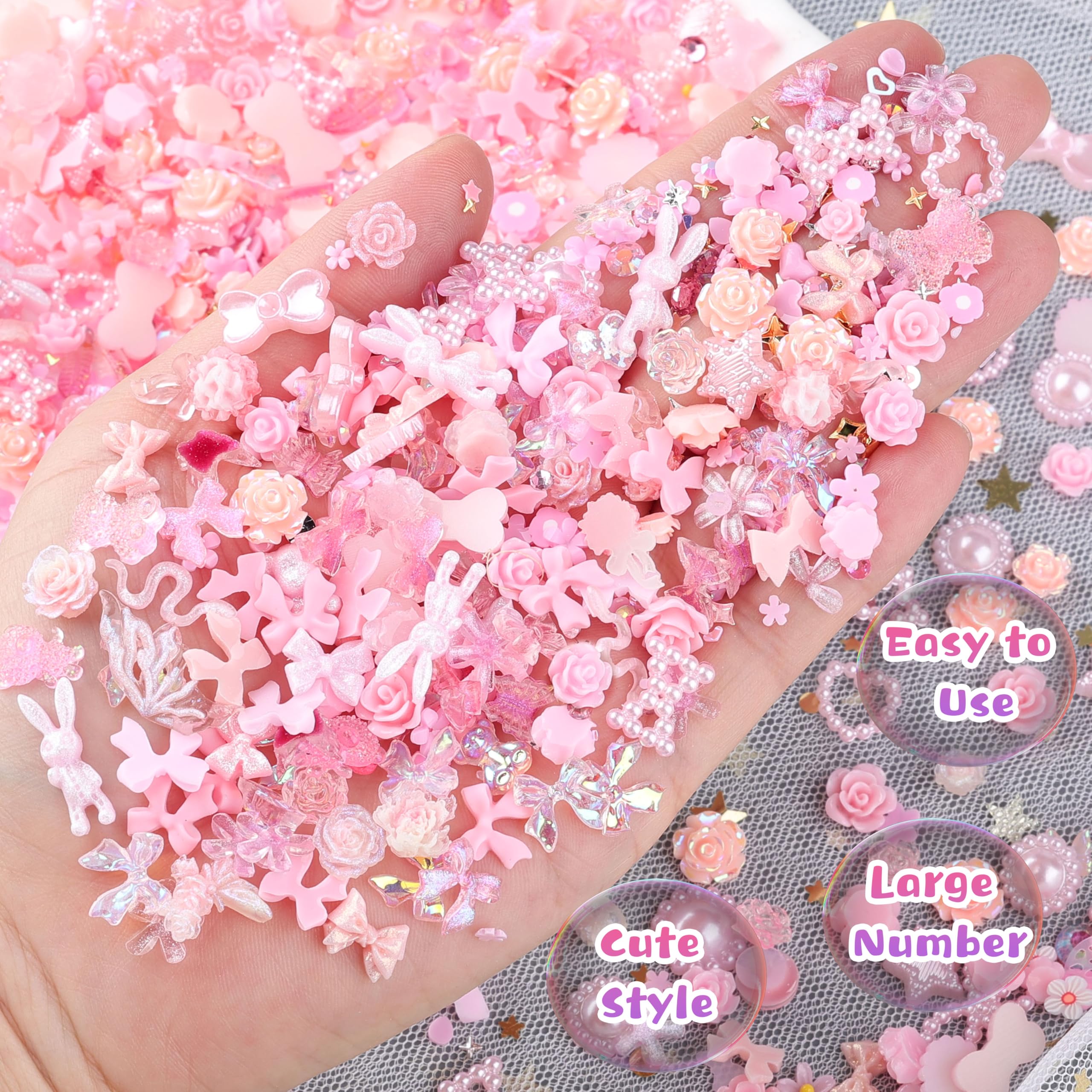 editTime finished manicure on hand showing cohesive pink design