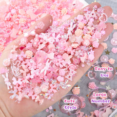 editTime finished manicure on hand showing cohesive pink design
