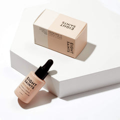 Eight Saints dropper dispensing serum showing smooth absorbent texture benefit