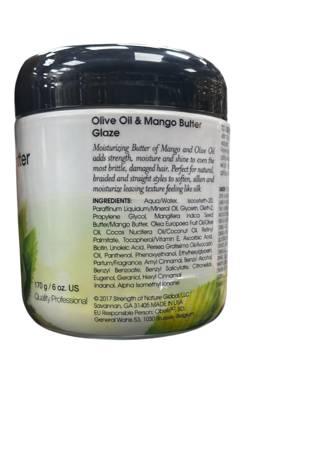 Elasta QP close-up of mango butter texture, shows creamy slip and moisturizing benefit