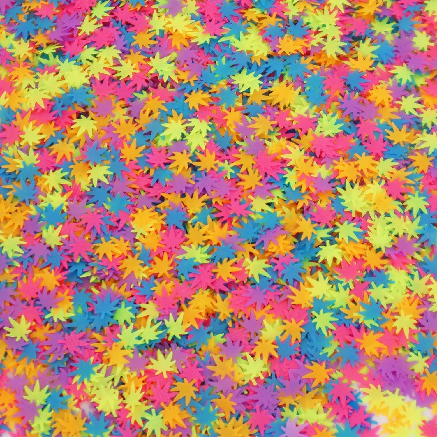 Electric Bliss Beauty packets beside a ruler to show leaf glitter scale and individual piece size