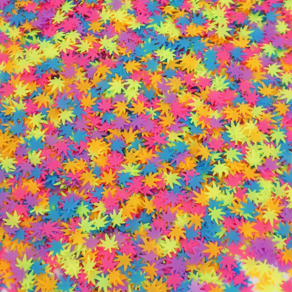 Electric Bliss Beauty packets beside a ruler to show leaf glitter scale and individual piece size