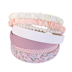 Eleilians floral knot headband on mannequin showcasing elegant pattern and texture