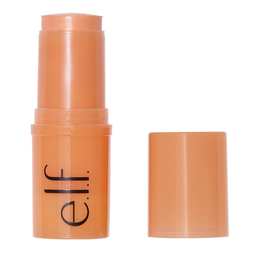 e.l.f. Daily Dew Stick next to a lipstick to show compact size and travel-ready convenience
