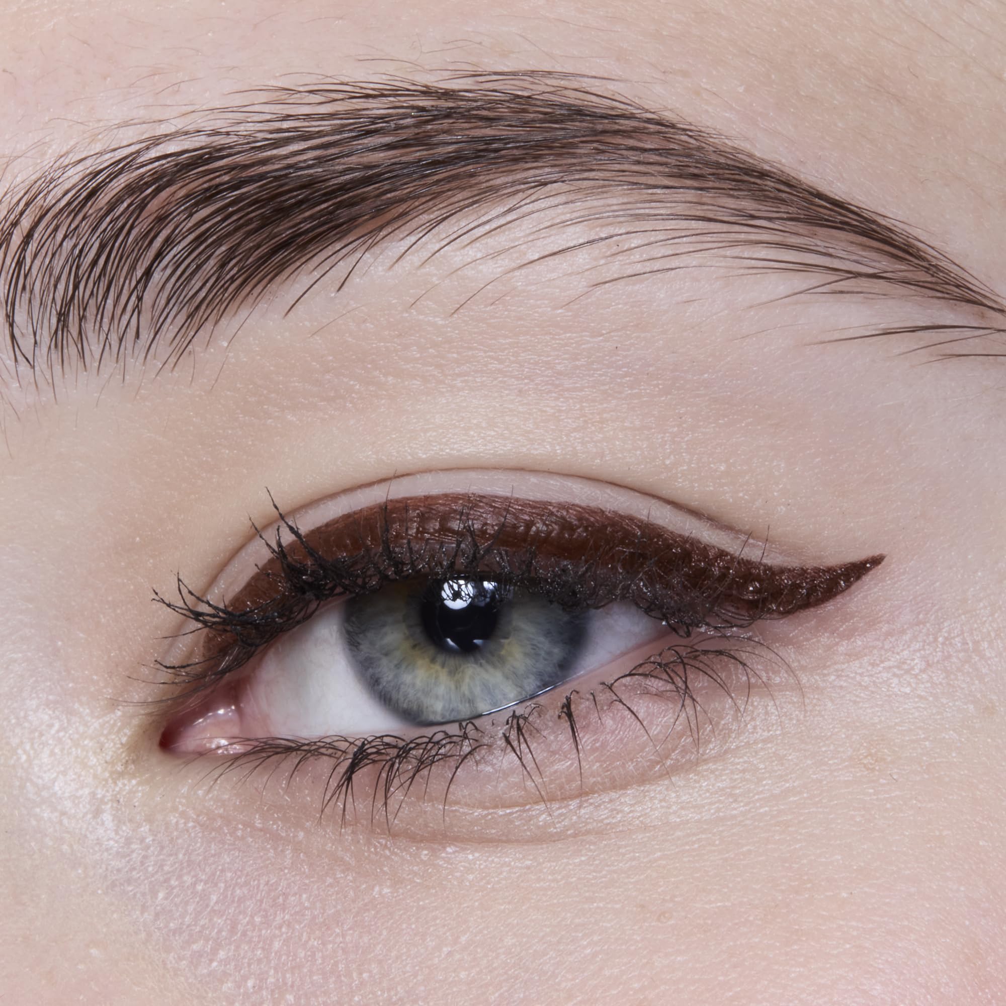 e.l.f. pen held during application demonstrating control for winged looks benefit