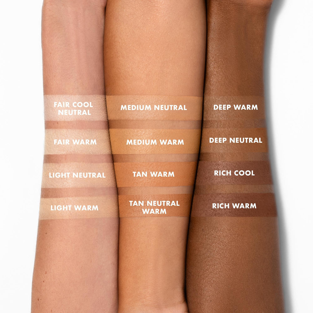 e.l.f. Halo Glow applying with puff to set makeup for a blurred, long-lasting finish benefit