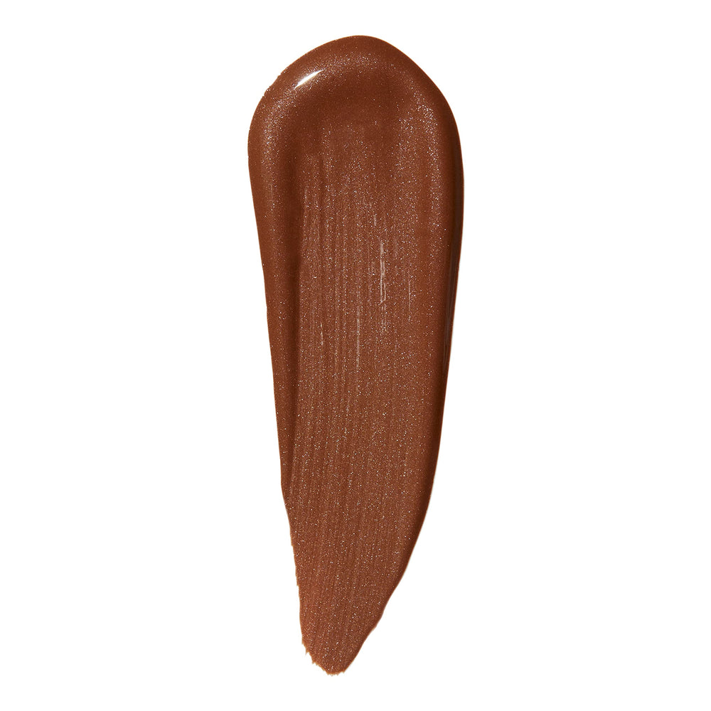 e.l.f. Halo Glow applied as highlighter on cheekbone for luminous lift
