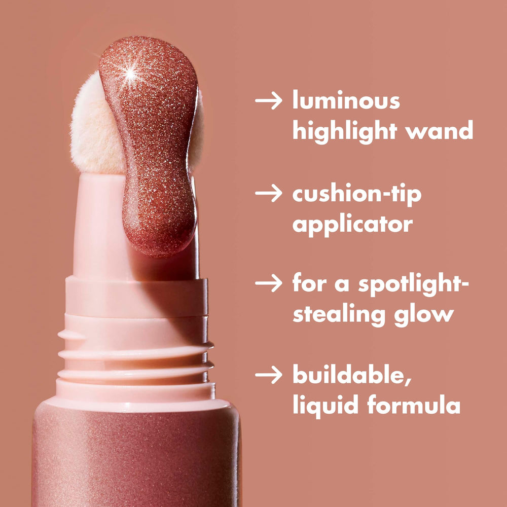 e.l.f. liquid highlighter texture swipe on back of hand benefit: buildable dewy finish