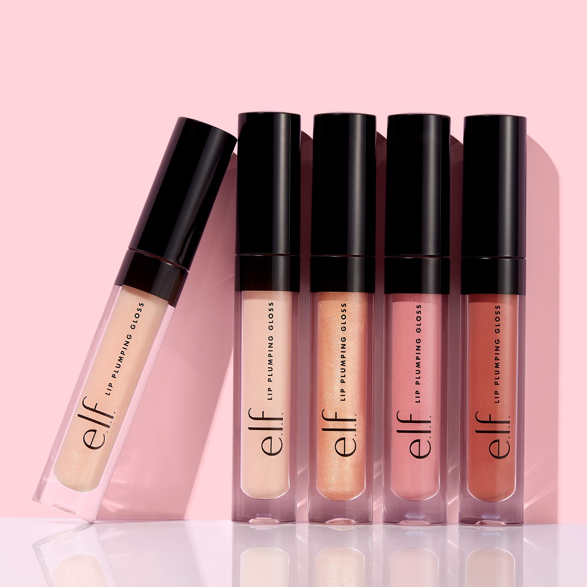 e.l.f. lifestyle shot of gloss in hand ready to apply for quick on-the-go touch-ups