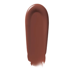 e.l.f. wand applying praline gloss to lips for instant plumping effect