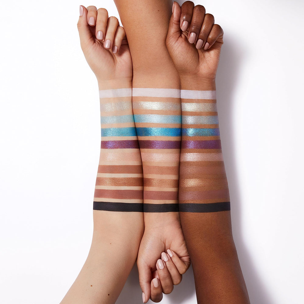 e.l.f. Perfect 10 texture swatch of blues and purples showing creamy payoff benefit