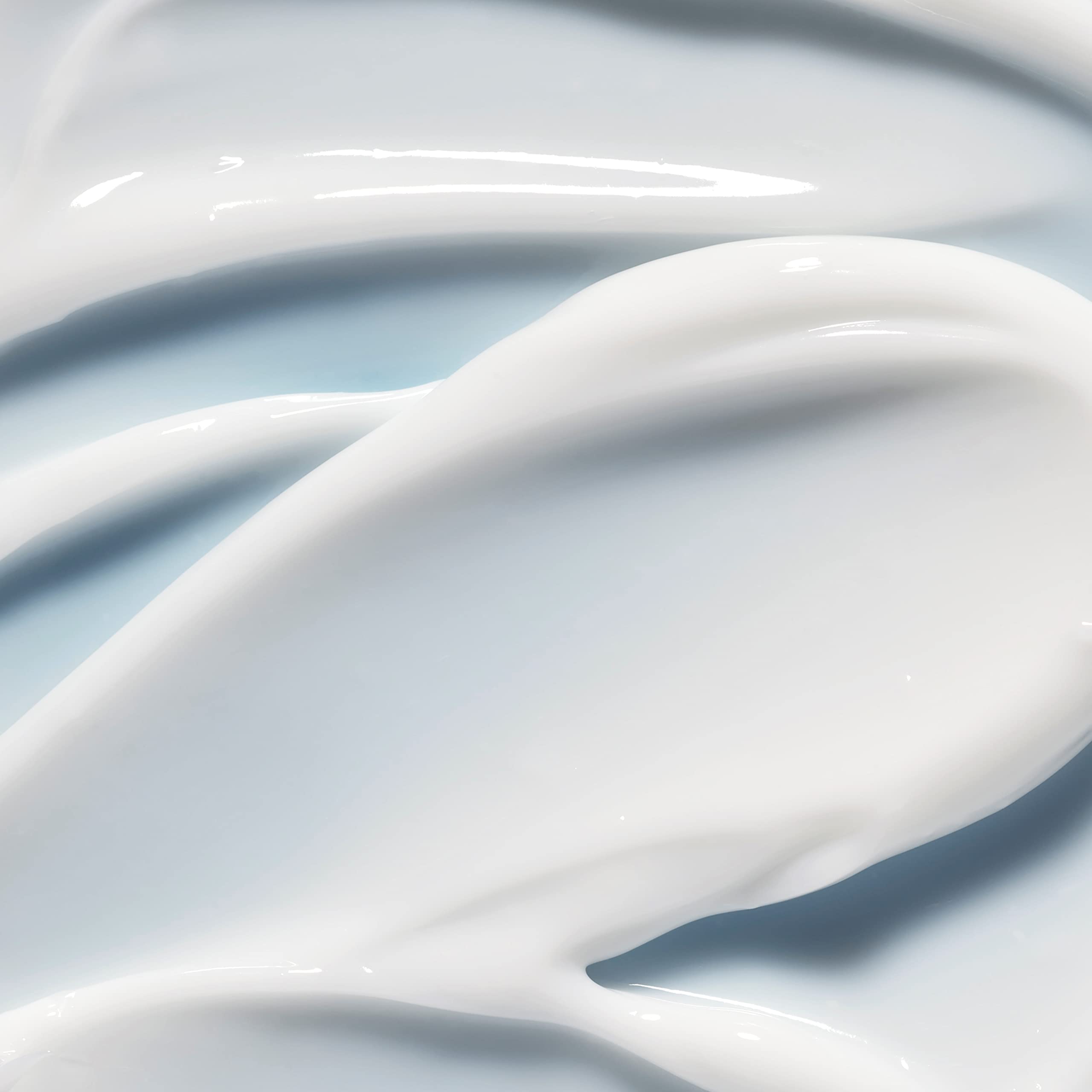 e.l.f. SKIN cream being gently tapped under eye showing smooth base for makeup benefit