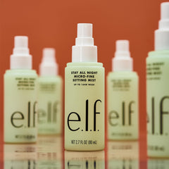 e.l.f. misting onto model to illustrate hydrating refresh and long wear benefit