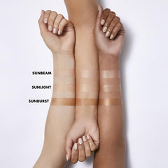 e.l.f. Suntouchable applied on hand demonstrating quick absorption and glow