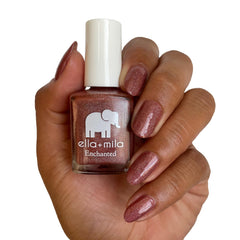 ella+mila painted nails swatch on hand showing holographic sparkle and wearable color