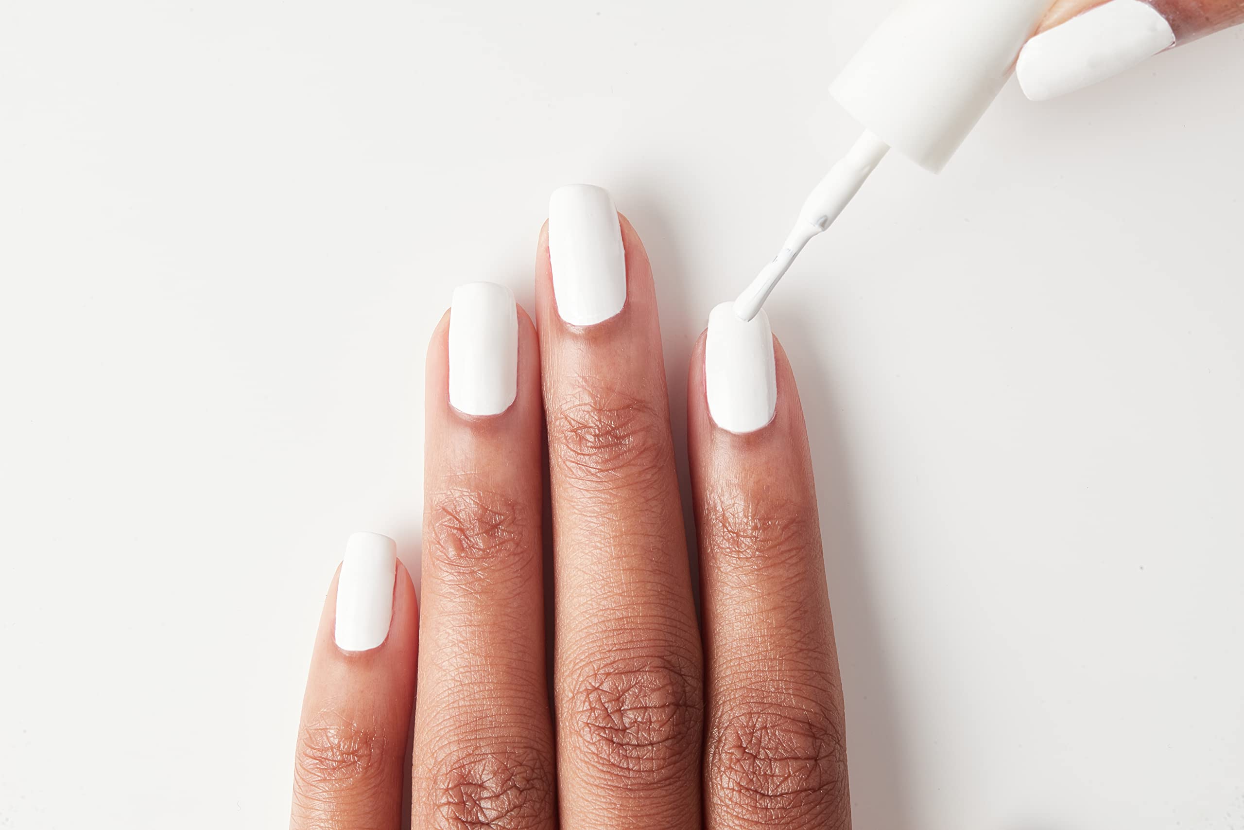 ella+mila textured close-up highlighting glossy surface and even coverage benefit