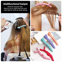 Ella & Sara clip beside hand for scale, demonstrating 4.5-inch size